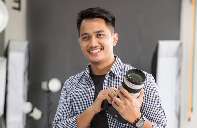 man holding a camera